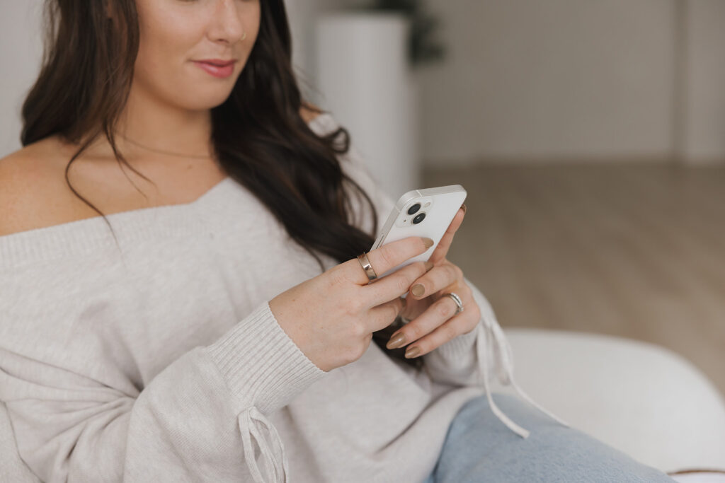 Danielle looking at phone